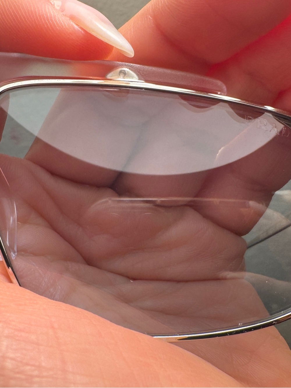 Prada Silver Frame Sunglasses with Light Blue Lenses unisex - Picture 10 of 13
